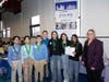 Sayville Middle School students pose with medals and awards after earning a special award for Best Farm-to-Table System and a third-place overall finish at the Future City Competition in New York City.