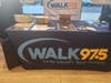 A WALK 97.5 radio table set up inside Wonder for giveaways and live music on opening day.