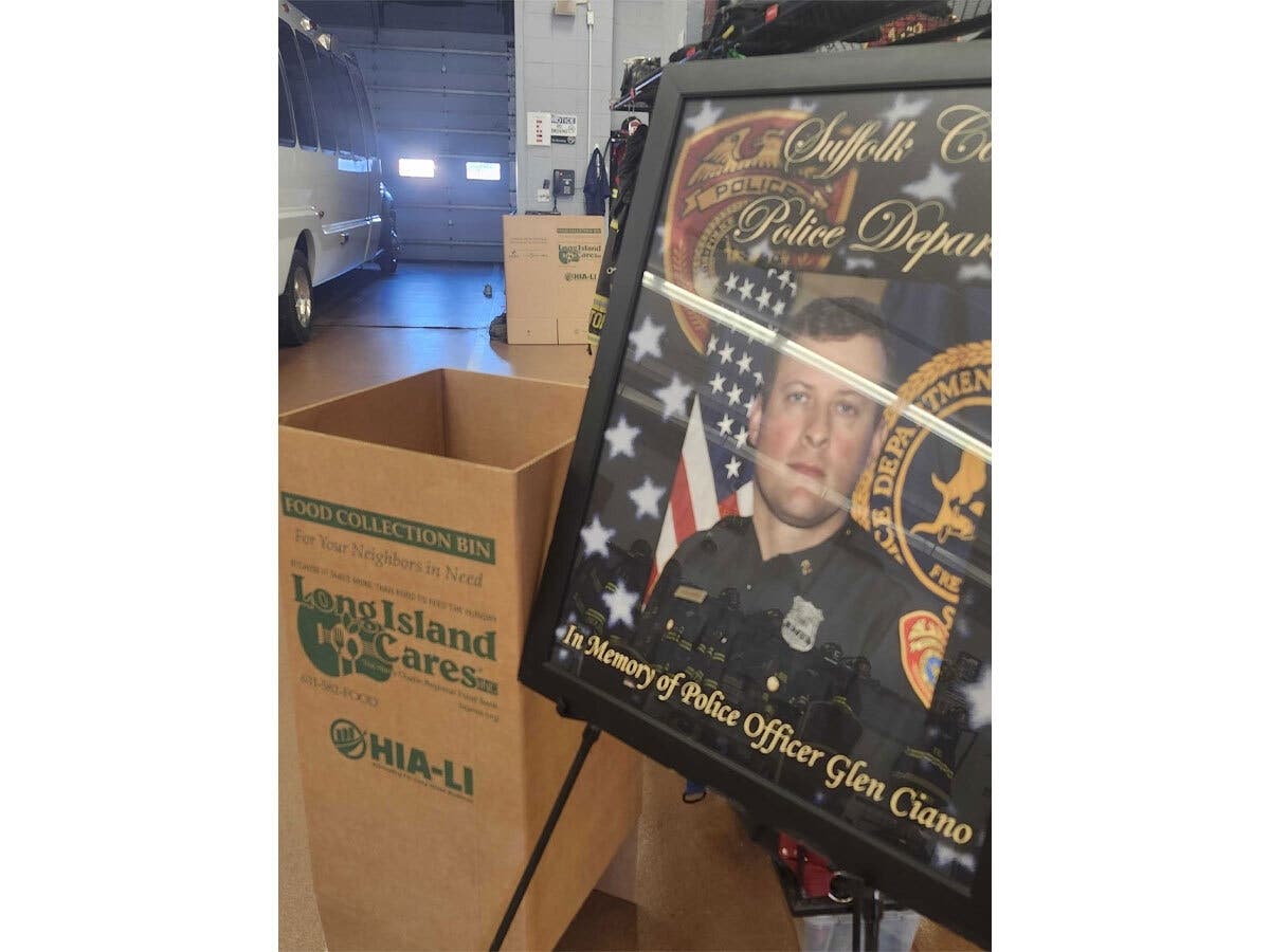 Donation bins and memorial displays were set up inside the Commack Fire Department as community members contributed blood and food for Long Island Cares.