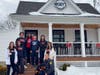 Smithtown High School East Student Leadership students outside Mickey’s Ice Cream Kitchen in St. James alongside adoptable dog Shiloh as part of the Town of Smithtown’s “A Scoop for Love” community campaign.