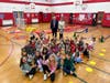 Students celebrate their efforts during Olympic-themed physical education classes at Timber Point Elementary School.