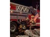 Firefighters work beside a ladder truck at the scene of a multi-occupancy dwelling fire on Great East Neck Road in West Babylon. More than 100 firefighters from 13 departments responded, officials said.