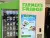 The interactive screen allows students to browse menu options and report out-of-stock items.