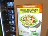 The Farmer’s Fridge machine offers protein-packed snack boxes, salads and fresh meals.