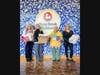 Representatives from the Smithtown Central School District pose with donated student artwork and supplies at Stony Brook Children’s Hospital.