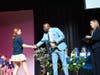 Beach Street Middle School Principal Dr. Anthony Bridgeman congratulates a student during the National Junior Honor Society induction ceremony on March 16.