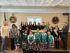 Girl Scouts from St. Patrick’s School gathered inside Smithtown Town Hall with town officials and first responders during a hands-on civic leadership program.