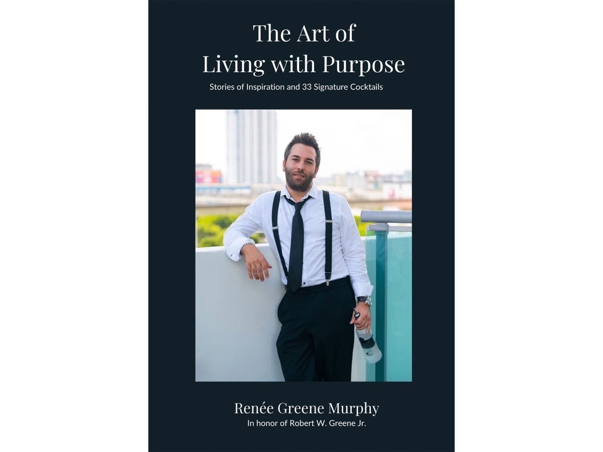 The cover of The Art of Living with Purpose: Stories of Inspiration & 33 Signature Cocktails by Renée Greene Murphy, written in honor of her late brother, Robert Greene Jr.