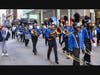Members of the North Babylon High School marching band perform along the parade route during the 2026 New York City St. Patrick’s Day Parade, showcasing their musical precision and school pride.