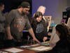 Families and students explore artwork and creative projects on display during Sayville High School’s annual Art Night.