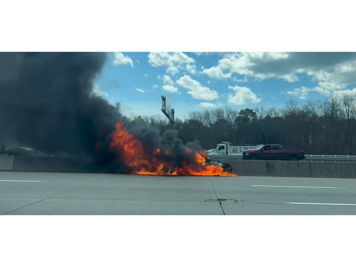 A passing motorist helped pull a driver from a burning car on Sunrise Highway in Bohemia on Tuesday morning. The man was hospitalized for smoke inhalation.

