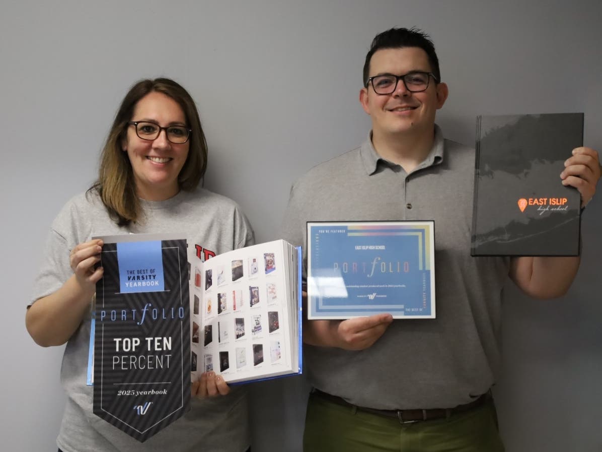 East Islip High School teachers Michael Augello and Heather Toomey celebrate the school yearbook’s inclusion in Varsity Yearbook’s distinguished Portfolio.