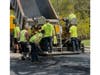 Highway Department crews pave a roadway in Smithtown as part of the town’s spring infrastructure improvements aimed at repairing winter damage and preparing for summer travel.