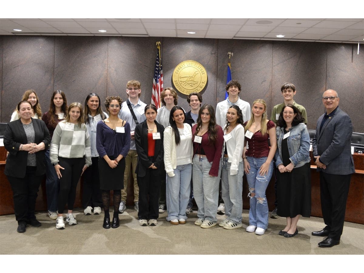Suffolk County district legislator Leslie Kennedy, left, and Sal Formica, right, hosted students from Smithtown’s two High Schools for a mock legislative session where students took on the roles of legislators and citizens advocating for legislation.