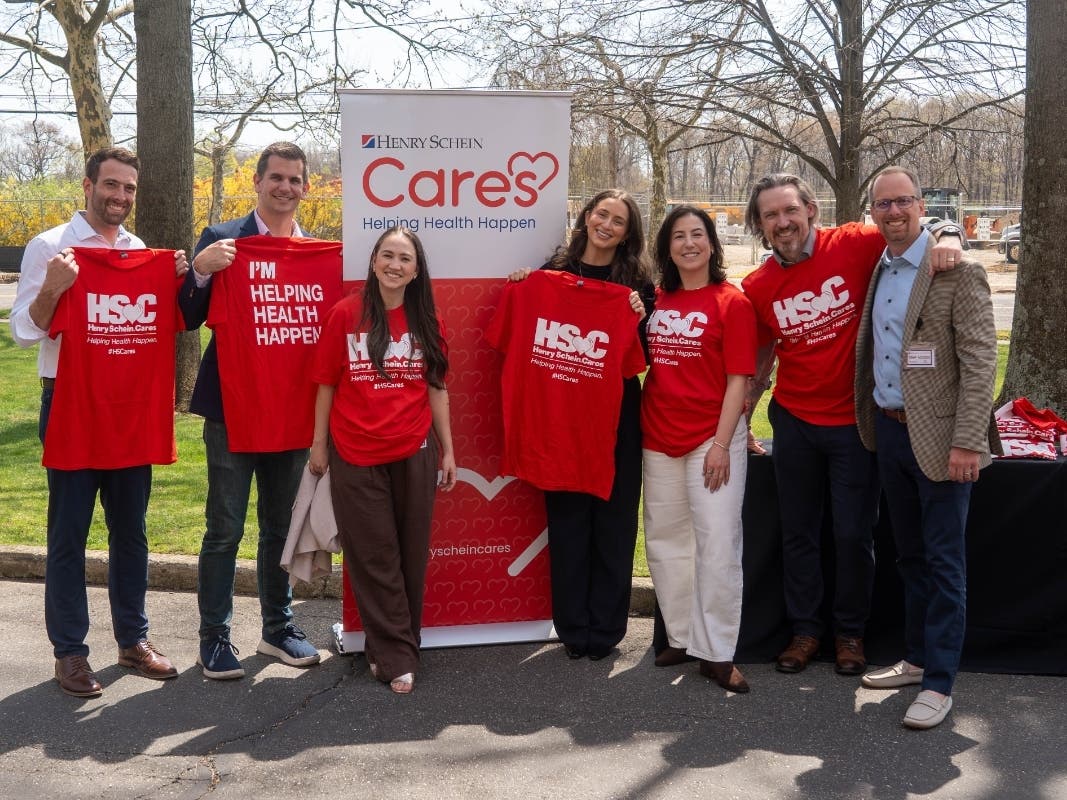 Team Schein Members at Henry Schein’s Melville headquarters assemble more than 1,500 hygiene kits for families supported by Ronald McDonald House Charities.