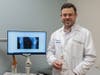 Orthopedic surgeon Dr. Michael Bisogno performs a cementless partial knee replacement at Huntington Hospital, the first procedure of its kind on Long Island.