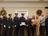 Sergeant Brendan Dennihy with department leadership and elected officials.