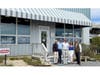 Jeff & Ryan Strong and Amanda & Matthew Barbara at the Strong's Marine Mattituck Bay Showroom.