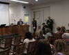 District Administrative Judge Andrew Crecca gives welcoming remarks as the court community takes their seats.