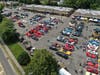 Car enthusiasts gather among classic and custom vehicles during a previous Paws of War Car Show in Nesconset.