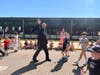 A first responder waves to students and families during Sunrise Drive Elementary School’s third annual First Responder Parade.