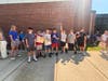 Sunrise Drive Elementary School students wave flags and hold signs thanking first responders during the school’s third annual parade.