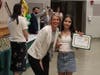 Oldfield Middle School Principal Maribeth Corr celebrates with student Sophia Arena during the school’s 20th Annual All-Star Awards ceremony on May 29.