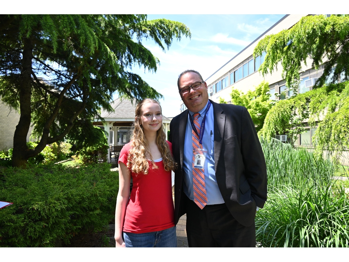 West Babylon Senior High School junior Addison Eglin with Principal
Stephen O’Leary.