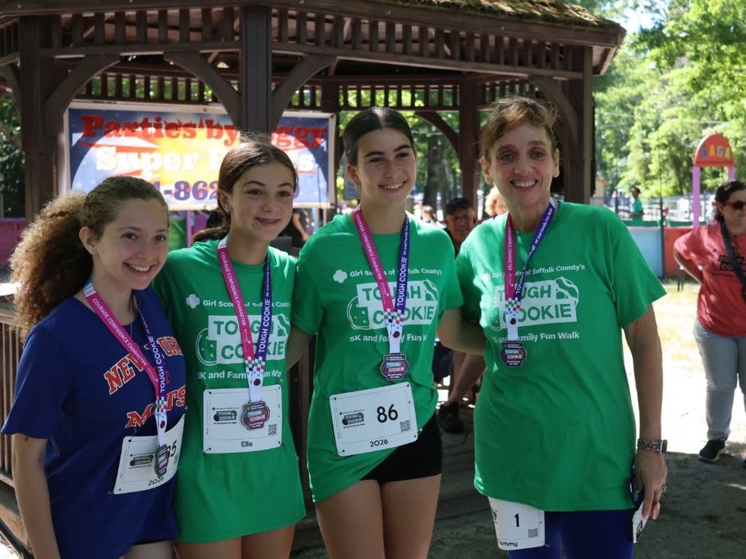 Left to Right: Ella Schoeppler, 13, Shoreham; Ella Mulienburg, 14, Hauppauge; Olivia Pearl, 13, Hauppauge; and Tammy Severino, President & CEO of Girl Scouts of Suffolk County.