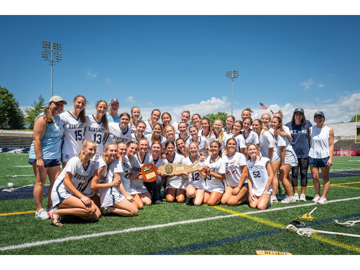 Huntington High School girls lacrosse players will celebrate after winning the 2026 NYSPHSAA State Championship.