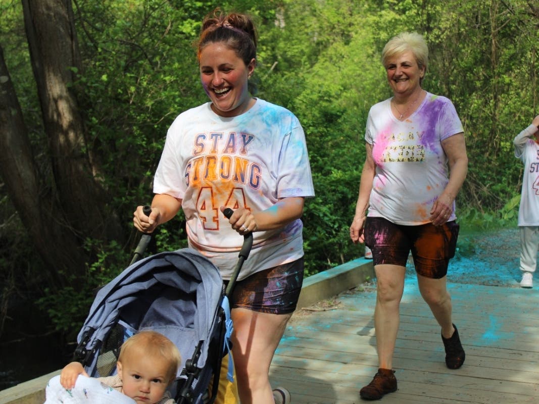 Babylon community members took part in a color run fundraiser for Luciano, a seventh grader battling leukemia.