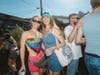 Attendees celebrate during the Babylon Pride Parade festivities in Babylon Village.  