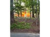 Flames engulf a home on Oakside Drive in Smithtown during a three-alarm fire Saturday.
