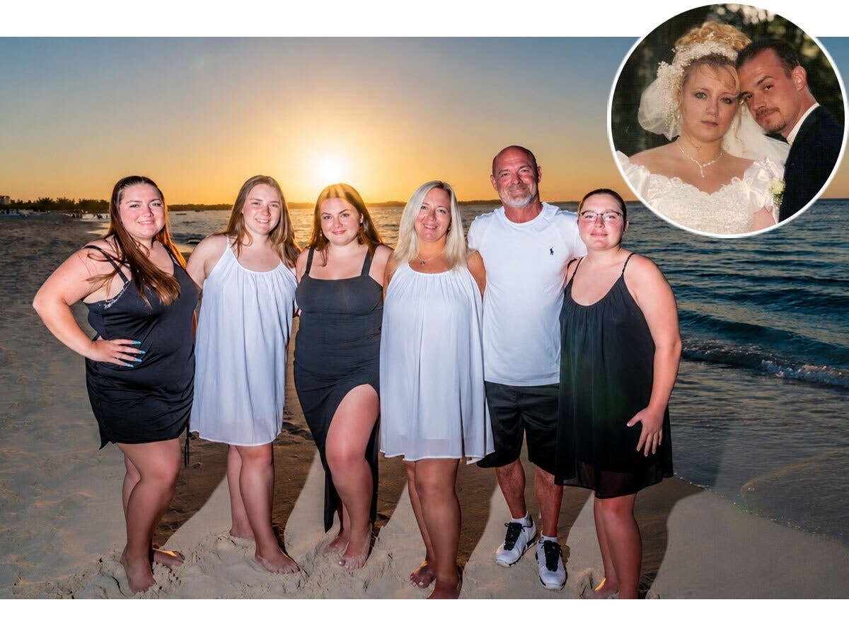 Michael Hartmann with his wife, Kim, and their four daughters in a family photo. Hartmann, 49, was killed outside his Bohemia home in a mistaken-identity shooting in 2022.  