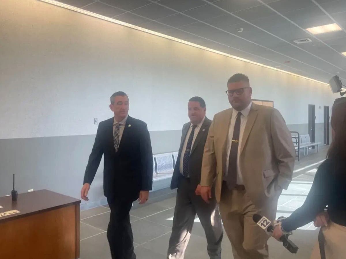 NYPD Detective Carl Rennhack, right, attended Wednesday’s sentencing in Riverhead. Rennhack is the widower of NYPD Officer Emilia Rennhack, who was killed in the 2024 Deer Park nail salon crash. Steven Schwally was sentenced to 25 years to life in prison.