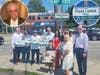 Attendees gather beneath the newly unveiled Frank Cassata Way sign on Deer Park Avenue in Deer Park on Aug. 26. Cassata, a longtime businessman and developer known as “Mr. Deer Park,” died in 2023.