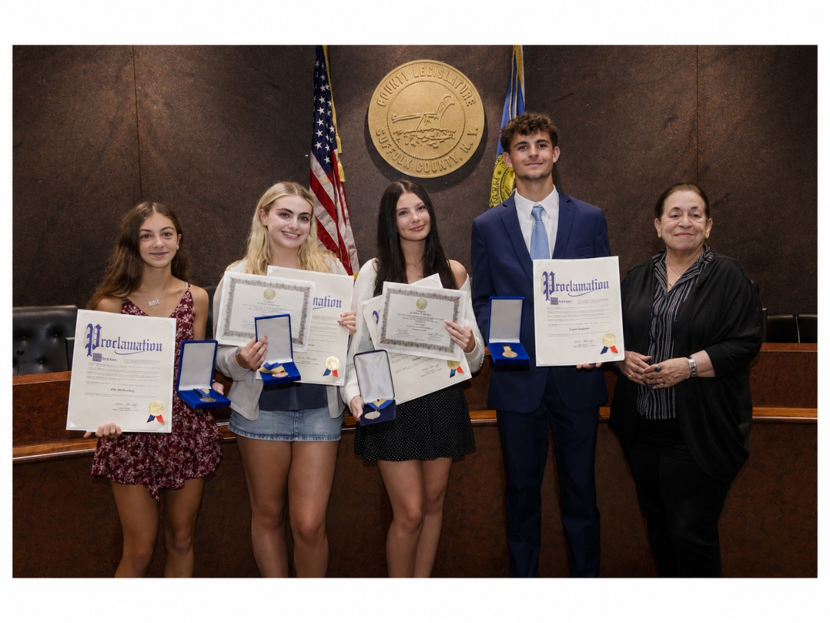 From left: Ella Muilenberg, Jillian Potenza, Lindsay TenBrink, Logan Singleton, Legislator Leslie Kennedy