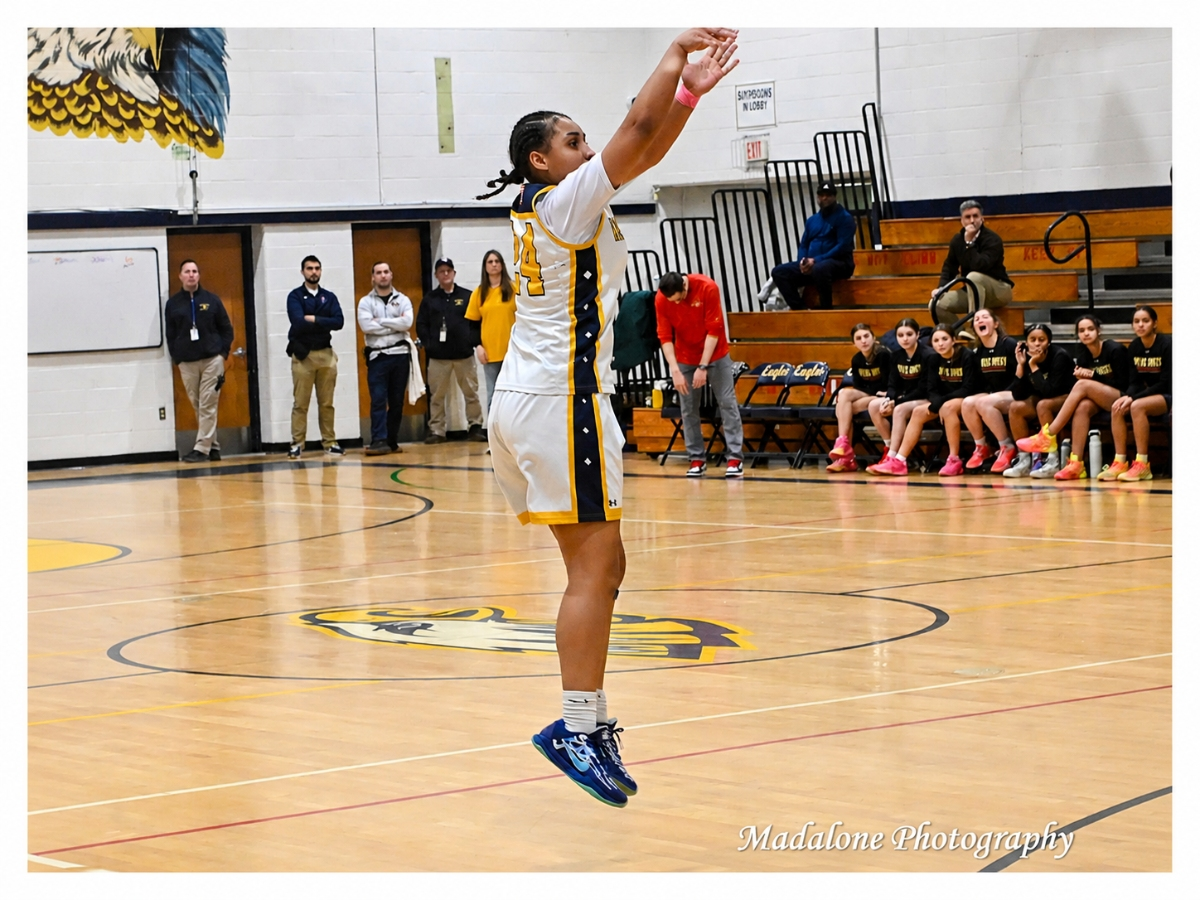West Babylon’s Jaelynn Burgess shoots during a girls basketball game. Burgess scored her 1,000th career point as a sophomore.