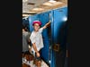 A student practices using his locker during James Wilson Young Middle School's Locker Day.