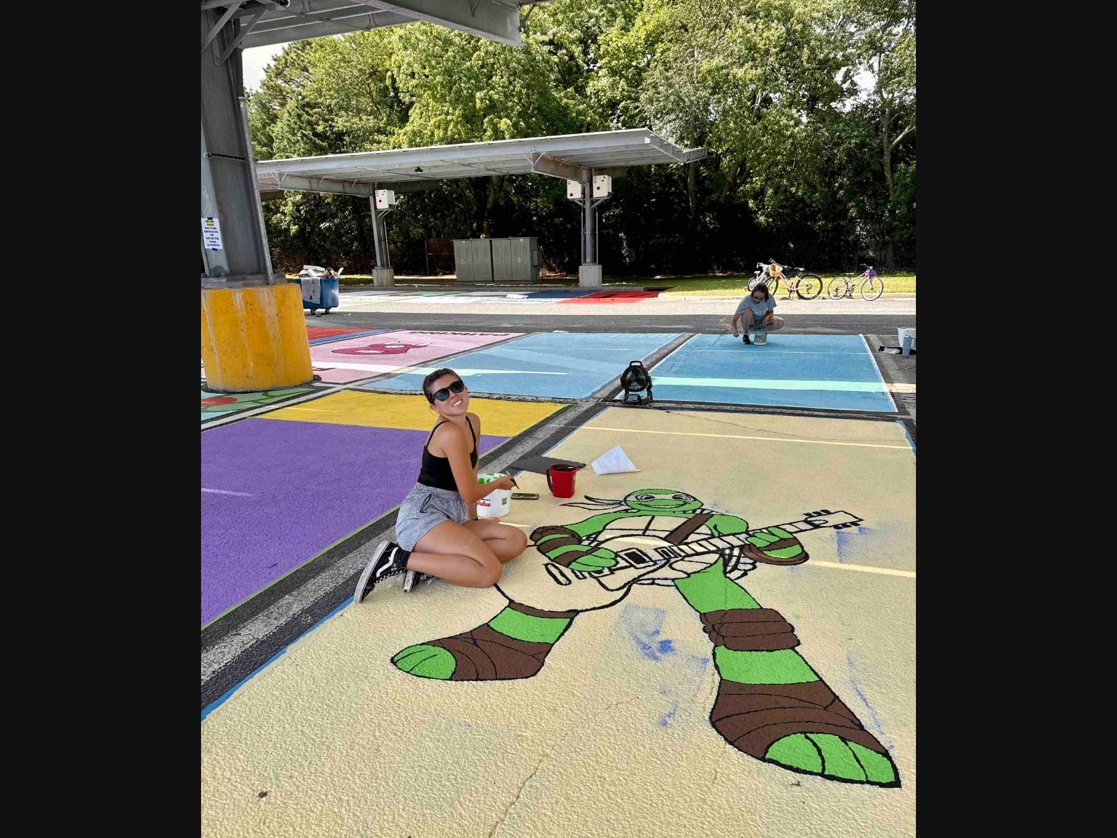 Connetquot High School’s incoming seniors, with help from family members and friends, painted and personalized their designated parking spaces ahead of the new school year. (