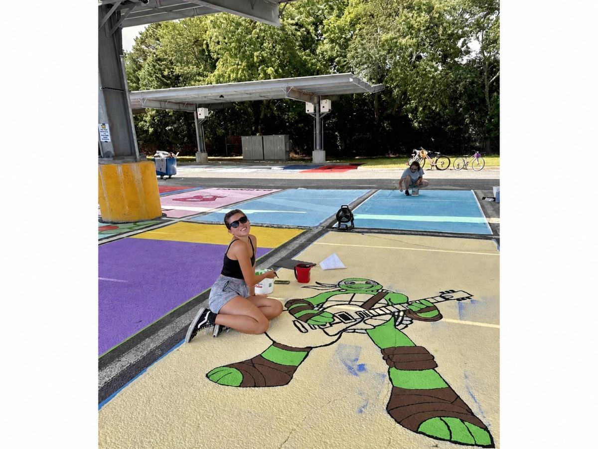 Connetquot High School’s incoming seniors, with help from family members and friends, painted and personalized their designated parking spaces ahead of the new school year. 