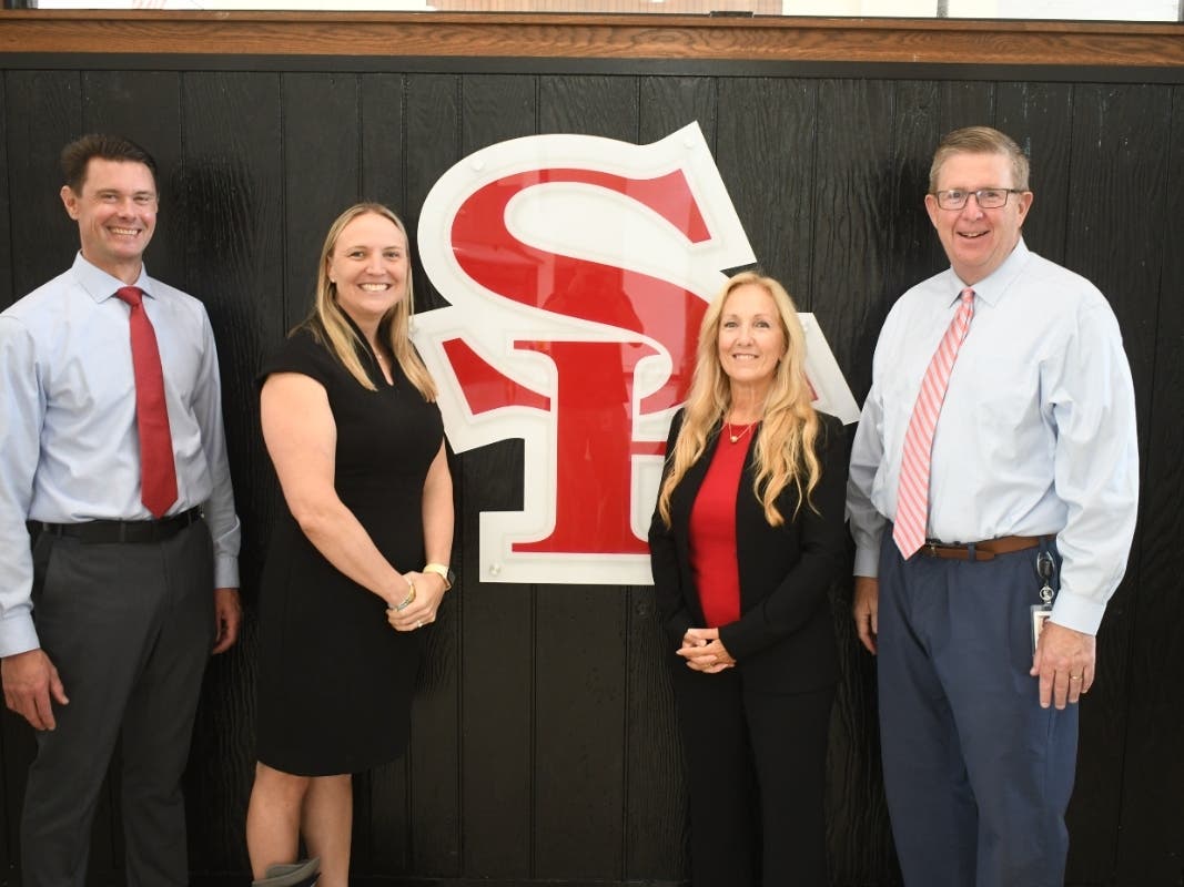From left: Smithtown High School East Principal Paul McNeil, Director of Science Dr. Stephanie O’Brien, Maria Zeitlin and Superintendent of Schools Dr. Mark Secaur.