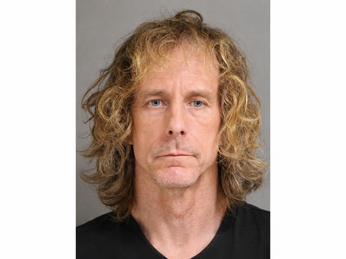 John Kennedy, 53, of St. James, was charged with fourth-degree stalking after police said he followed an 18-year-old former Bay Shore High School student to Selden.  