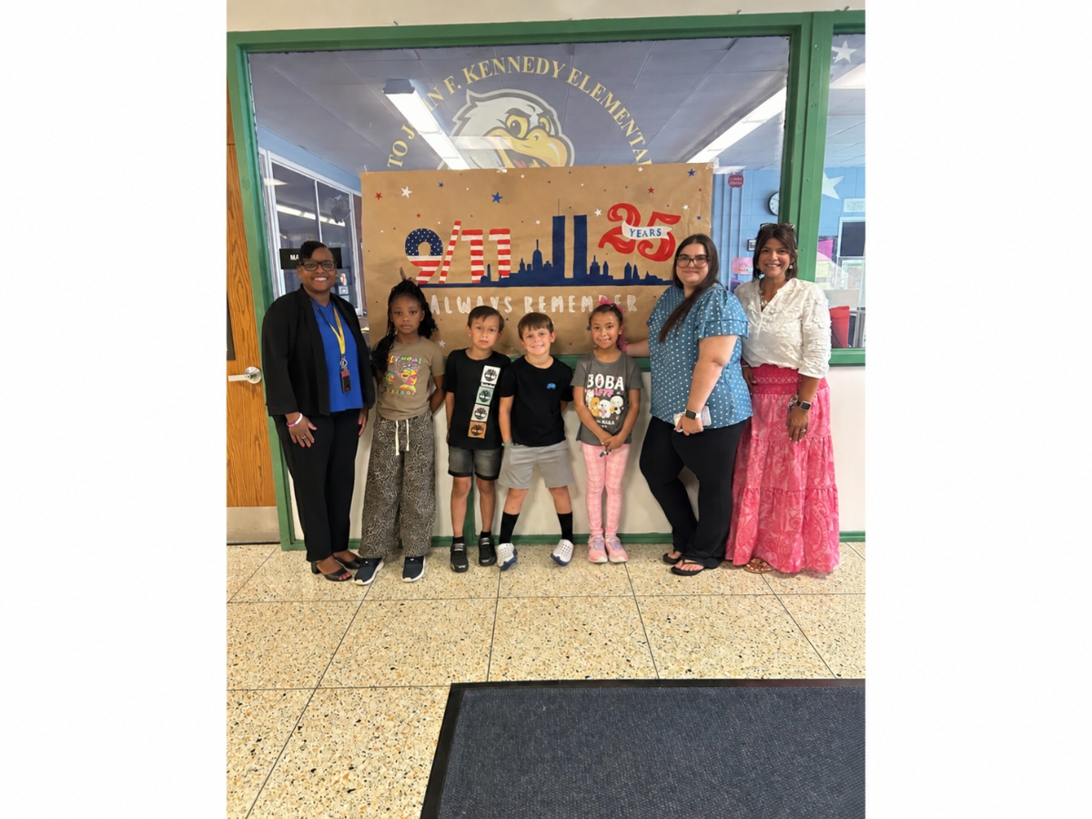 John F. Kennedy Elementary School Principal Denisha Van Liew; second graders Bijoux Okolo, Jose Benitez Castillo, Grayson Carlin and Yessibeth Castillo Maldonado; West Babylon High School senior Lia DeGennaro; and teacher Lisa DeGennaro.