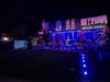 Programmable lights displaying “9/11” and New York City imagery cover James Hentschel’s Deer Park home ahead of the 25th anniversary of the attacks.