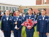Brentwood High School AFJROTC cadets pose with a ceremonial bell and patriotic floral arrangement during the school’s Sept. 11 memorial service.