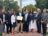 From left, Jennifer Brownyard, Board Trustee; Guy Leggio, Board Vice President; Nadine Summers; Ken Summers; Dr. Steven J. Maloney, Superintendent of Schools; Susan Gargan, Board Trustee; Andrew Arcuri, Board President and Louis Bettinelli, Board Trustee.