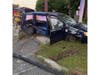 A heavily damaged minivan at the scene of Thursday morning's crash in Smithtown. Firefighters used the Jaws of Life to free a person trapped inside a vehicle, officials said.