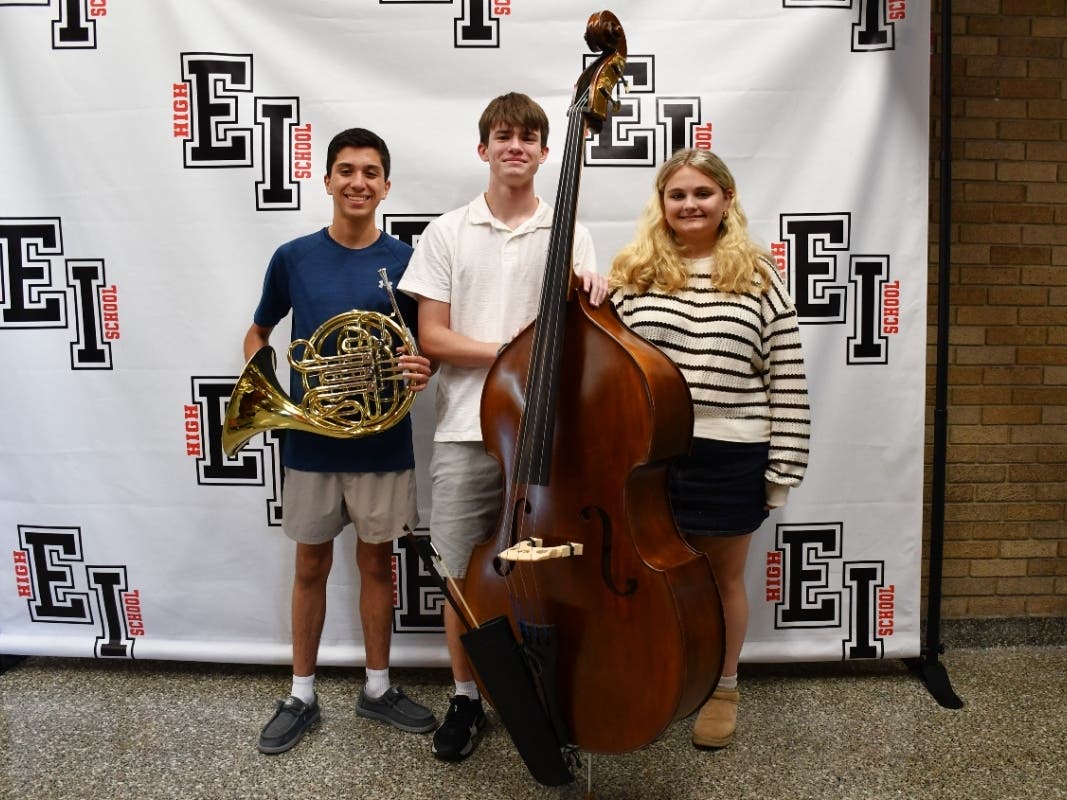 East Islip High School musicians Luke Tursi, left, an All-State alternate on French horn; Evan Kornely, selected for the All-State String Orchestra on double bass; and Eva Daugherty, selected for the All-State Mixed Chorus as a soprano.