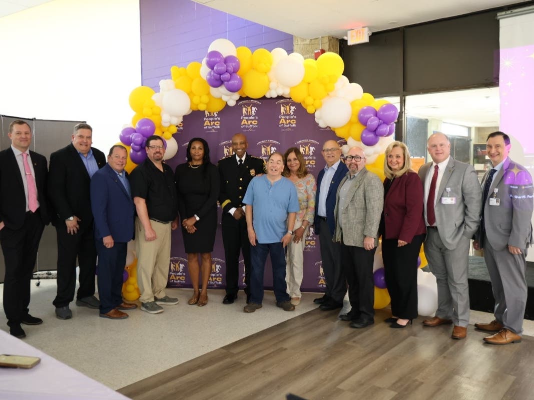 John McGugan, CEO, People's Arc of Suffolk, with representatives of the award winners HIA-LI, Suffolk County Sheriff Errol Toulon, and Designs for Vision.